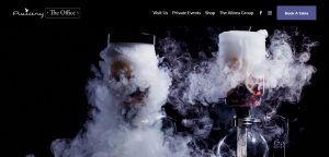 A website with smoke coming out of a bottle.
