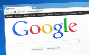 The google logo is displayed on a computer screen.